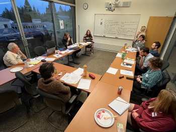 A group of students working together at a table.