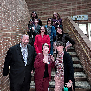 The L&C team and coaches at the National Speech tournament. Front row: Director of Speech/Debate Joe Gantt, Sol Camper BA '26, D...