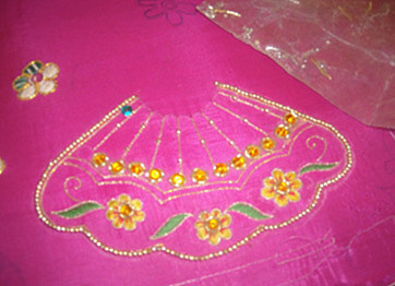 This diety dress is an example of poshak needlework. (Photo courtesy of Food for Life Vrindavan)