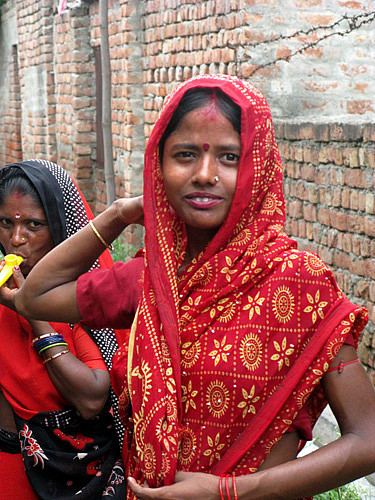 Vrindavan women, one playing a kazoo Walter brought for the children