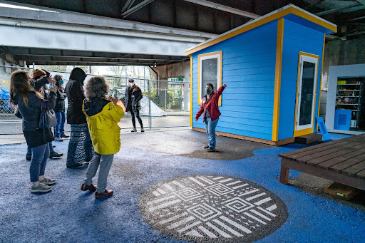 Zack Hart standing in front of the blue hub of Hygiene4All.
