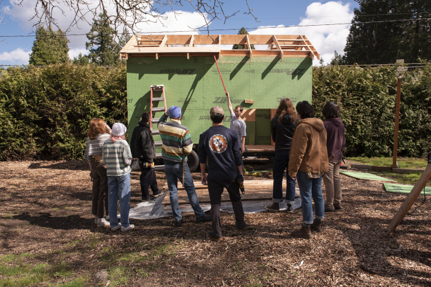 Tiny House Club members admire their hard work.