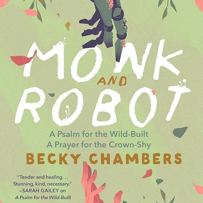 Book cover for Monk and Robot by Becky Chambers, featuring a robot hand reaching down toward a human hand against a green leafy background.